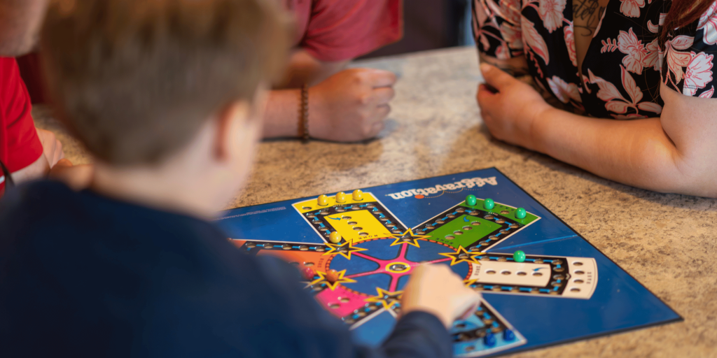 Family playing a board game