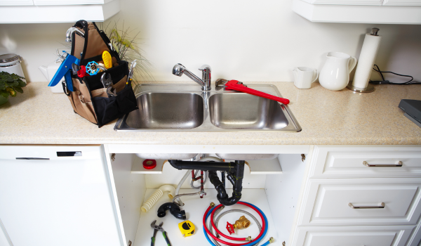 Kitchen plumbing home repair that was made possible by a donation to the Springfield Community Land Trust